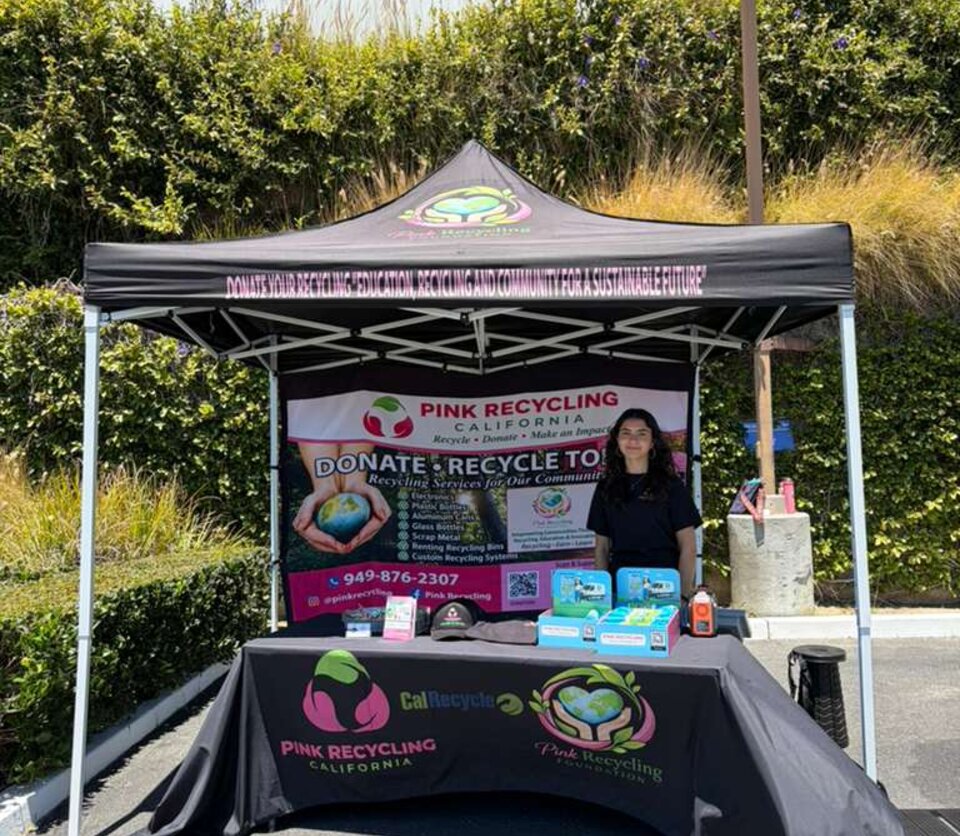 Pink Recycling community event booth